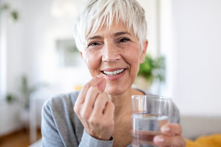 Head,Shot,Portrait,Happy,Woman,Holds,Pill,Glass,Of,Water,